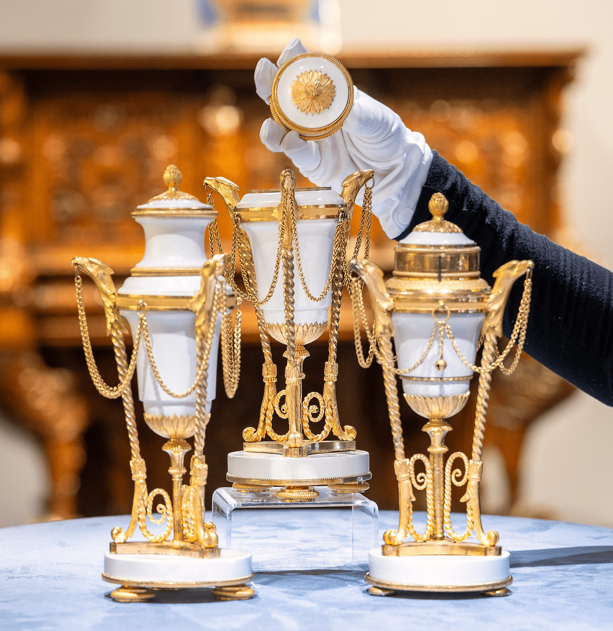 Louis XVI Style Gilt Marble Cassolettes and Clock